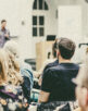 Man giving presentation in lecture hall at university.