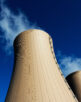 Cooling towers of nuclear power plant against  blue sky