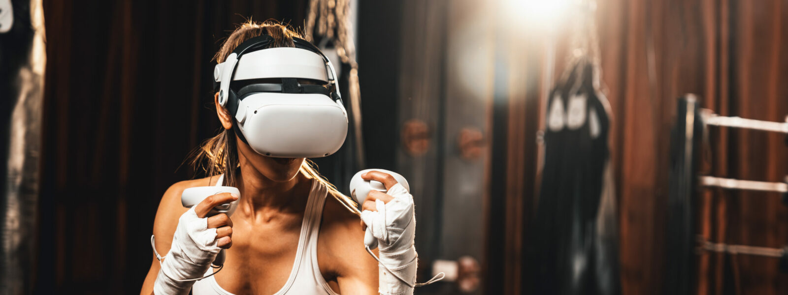 Female boxer training with VR or virtual reality. Impetus