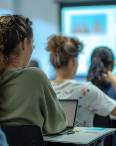 A classroom with students learning about technology and digital skills, preparing for a tech-driven workforce.