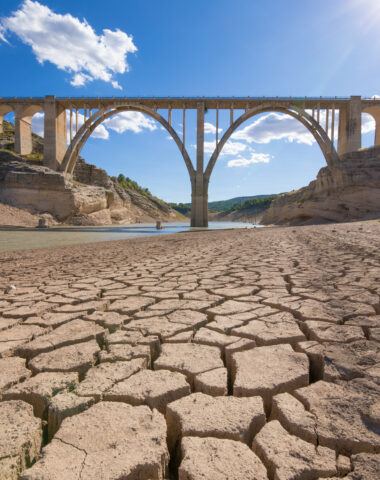 drought in spanish reservoir with viaduct